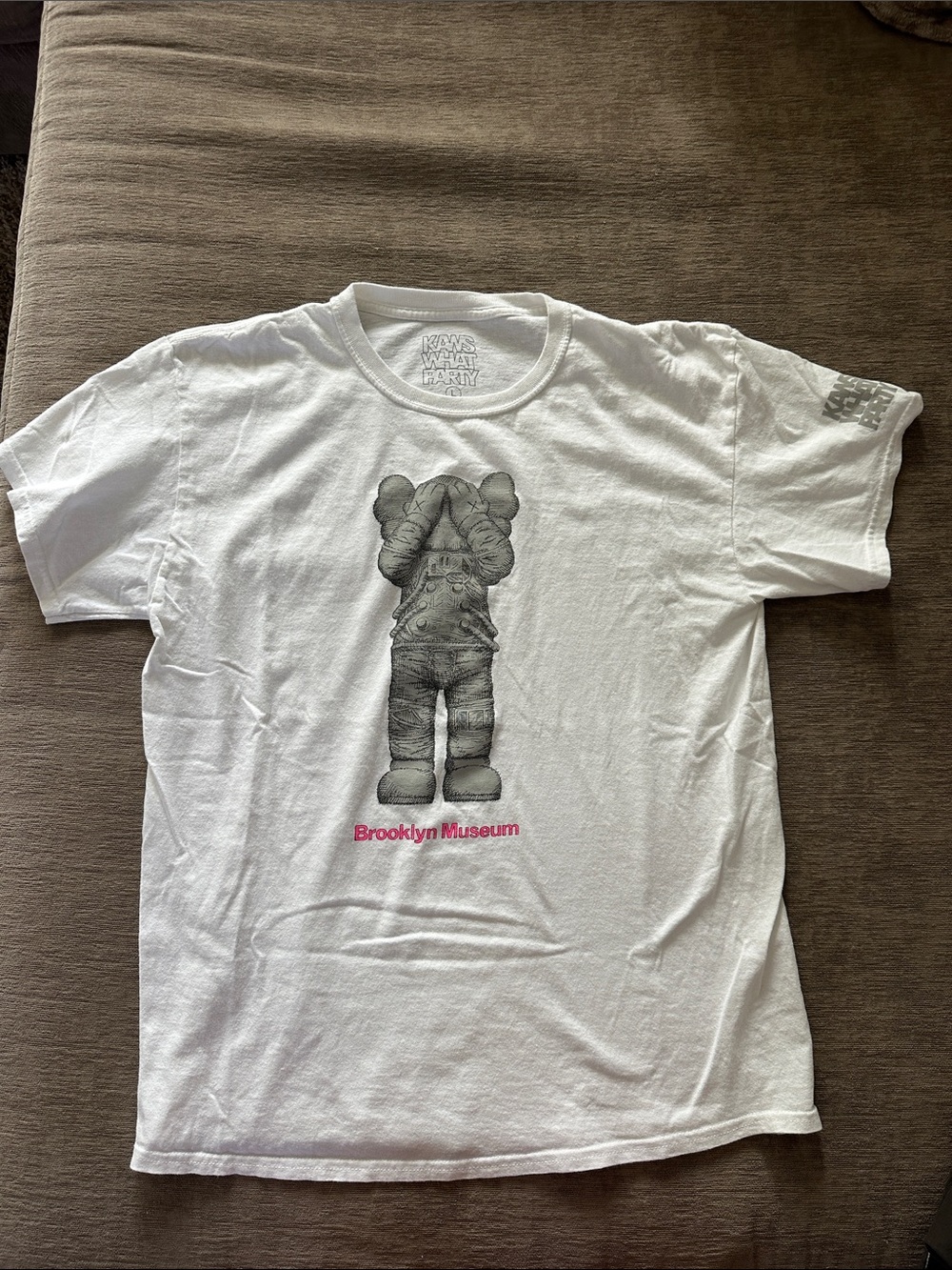 KAWS What Party Tee with Grey Companion Figure and Pink 'Brooklyn Museum' Text
